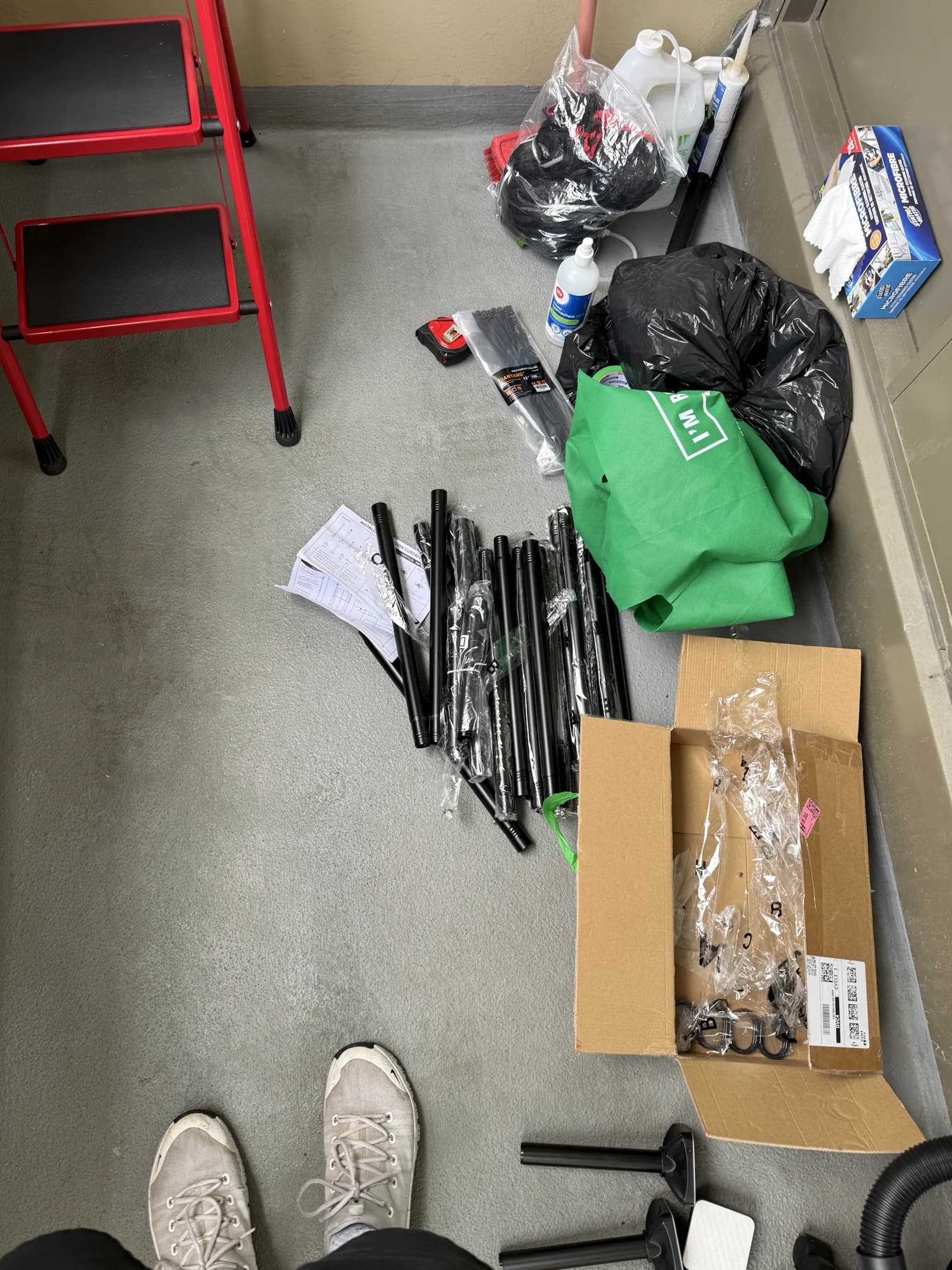 Bird-control hardware prepared for a balcony installation